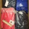 The photo shows a package with clothing in the category AJW.