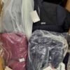 The photo shows a package with clothing in the category AJW.