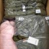 The photo shows a package with clothing in the category AJW.