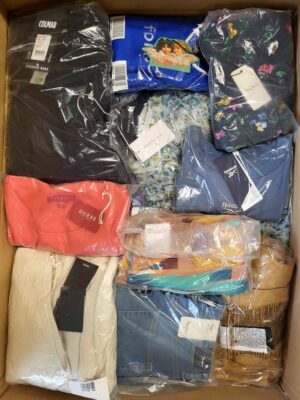 The photo shows a package with clothing in the category AW.