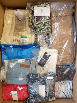 The photo shows a package with clothing in the category AW.