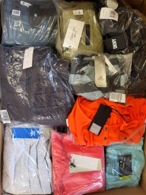 The photo shows a package with clothing in the category AW.