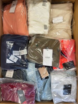 The photo shows a package with clothing in the category AW.