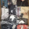 The photo shows a package with clothing in the category AP.