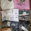 The photo shows a package with clothing in the category AP.