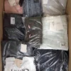 The photo shows a package with clothing in the category AP.