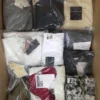 The photo shows a package with clothing in the category AP.
