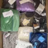 The photo shows a package with clothing in the category AP.