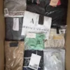 The photo shows a package with clothing in the category AP.