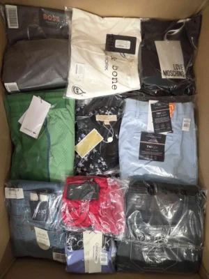 The photo shows a package with clothing in the category AP.