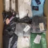 The photo shows a package with clothing in the category AP.