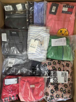 The photo shows a package with clothing in the category AP.