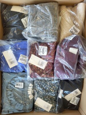 The photo shows a package with clothing in the category YA.