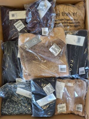 The photo shows a package with clothing in the category YA.