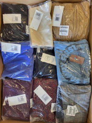 The photo shows a package with clothing in the category YA.