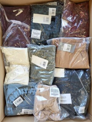 The photo shows a package with clothing in the category YA.