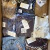 The photo shows a package with clothing in the category YA.