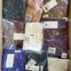 The photo shows a package with clothing in the category YA.