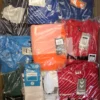 The photo shows a package with clothing in the category H.