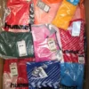 The photo shows a package with clothing in the category H.