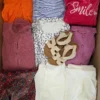 The photo shows a package with clothing in the category BSN.