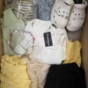 The photo shows a package with clothing in the category BSN.