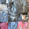 The photo shows a package with clothing in the category D.
