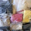 The photo shows a package with clothing in the category D.