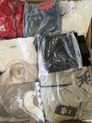 The photo shows a package with clothing in the category B.
