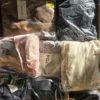 The photo shows a package with clothing in the category B.