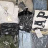 The photo shows a package with clothing in the category B.