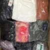 The photo shows a package with clothing in the category B.