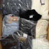 The photo shows a package with clothing in the category C.