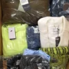 The photo shows a package with clothing in the category C.