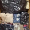 The photo shows a package with clothing in the category C.