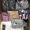 The photo shows a package with clothing in the category C.