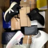 The photo shows a package with footwear in the category BS.