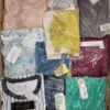 The photo shows a package with clothing in the category AR.
