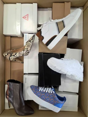 The photo shows a package with footwear in the category BS.