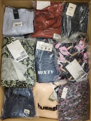 The photo shows a package with clothing in the category AW.