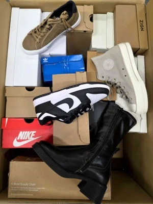 The photo shows a package with footwear in the category CS.