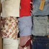 The photo shows a package with clothing in the category TSC.