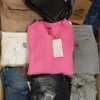 The photo shows a package with clothing in the category TSC.