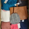 The photo shows a package with clothing in the category TSC.