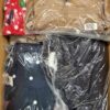 The photo shows a package with clothing in the category AJW.