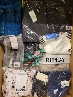 The photo shows a package with clothing in the category A.