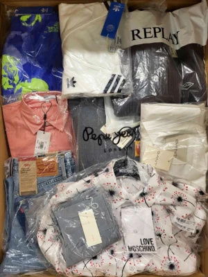 The photo shows a package with clothing in the category A.