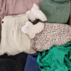The photo shows a package with clothing in the category SN.