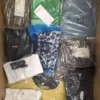 The photo shows a package with clothing in the category AP.