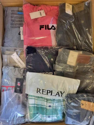 The photo shows a package with clothing in the category A.